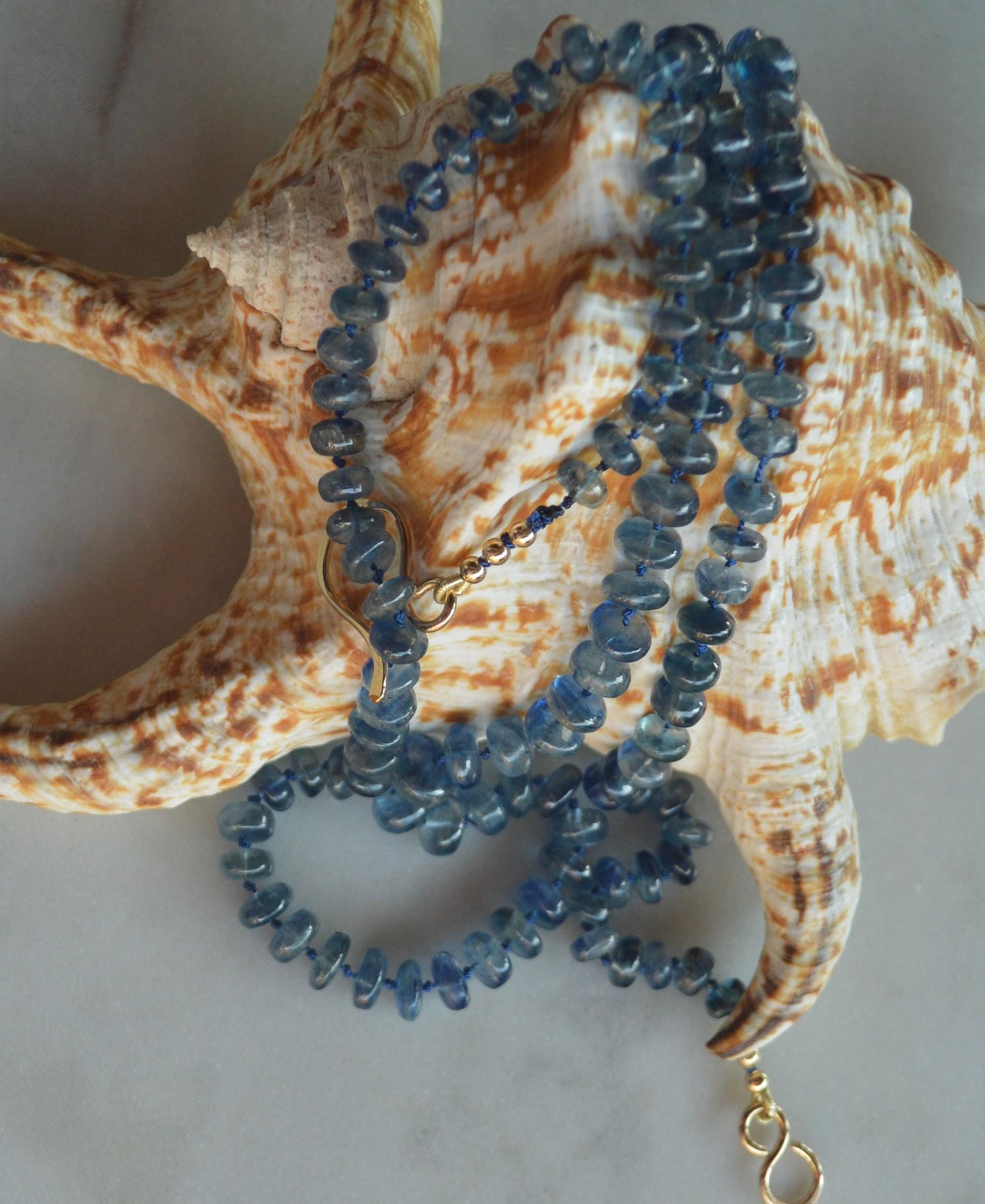 Moss Aquamarine Smooth Rondelle Gemstone Necklace Hand Knotted on Dark Blue Silk.  27.5"